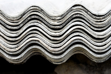 a stack of slate sheets for roofing.