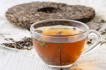 Special chinese tea puer, tea leaf on wooden table