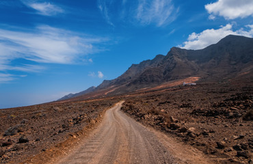 Southern Fuereteventura , view towards Cofete beach and Villa Winter from a mountain pass. October 2019