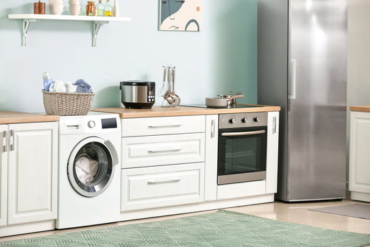 Interior Of Kitchen With Modern Washing Machine