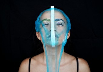 portrait of a young woman with a mask