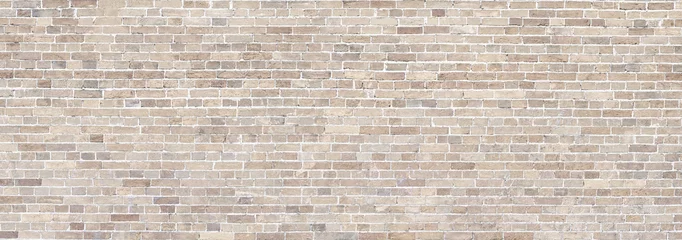 Fotobehang Bakstenen muur Bakstenen muur beige steen panorama achtergrond