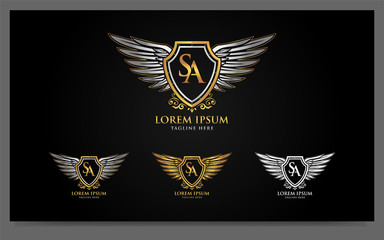 Obraz premium Luxury alphabets logo with golden badges wings design template. Signs, symbol illustration