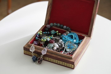 wooden box with jewelry