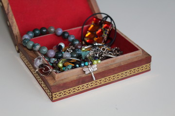 wooden box with jewelry