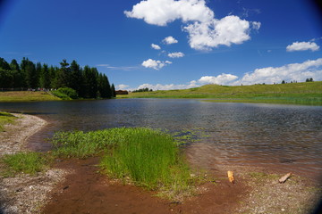 lake at the lavaze pass. Lavaze Pass in South Tyrol, Bolzano Province: is one of the most fascinating landscapes of Val di Fiemme. Trentino Alto Adige. Dolomiti, northern Italy.