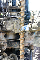 Fototapeta na wymiar Drilling machine for drilling holes in the ground