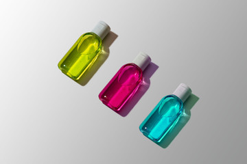 Antibacterial Hand Sanitizer of Cian, Magenta and Yellow Colors. Minimalism. Coronavirus 2019 nCov, Covid 19