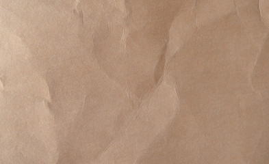 Brown crumpled paper texture background.