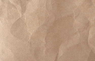 Brown crumpled paper texture background.