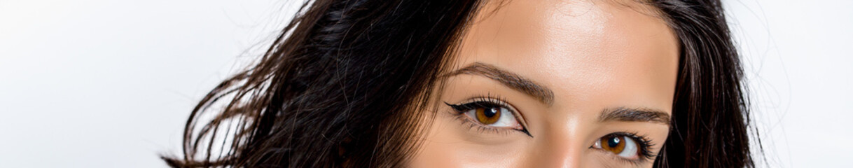 close-up photo of woman eye with eyeliner makeup   on white background.