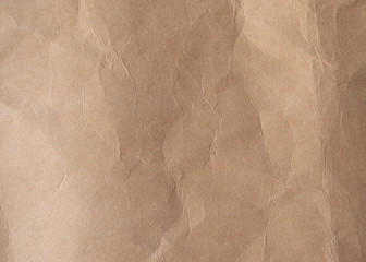 Brown crumpled paper texture background.