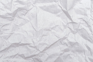 Obraz premium White crumpled paper texture. Abstract paper pattern for background. Close-up.