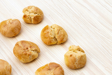 homemade buns on a wooden board, bakery background