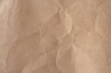Brown crumpled paper texture background.