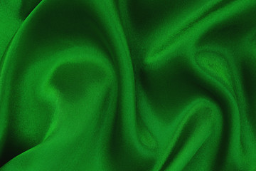 Dark green fabric cloth texture for background and design art work, beautiful crumpled pattern of...