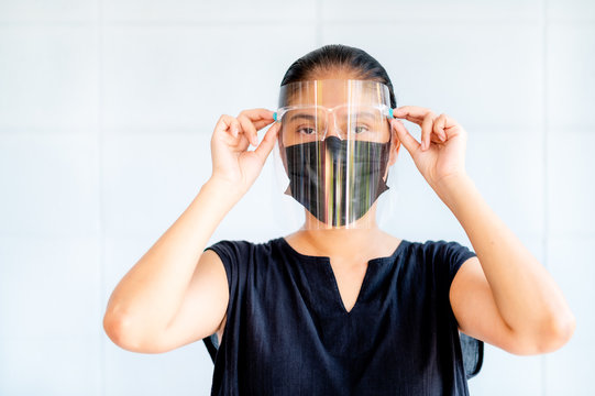 Asian Women Have To Use Masks And Face Shields To Protect Against Pollution From Dust And To Prevent Infections From Secretions That Spread In The Air