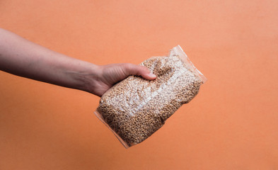 Pearl barley in a package. Pearl porridge.