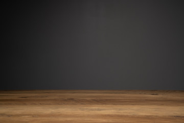 top of wooden table and dark background with copy space.