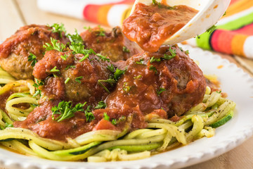 Meatballls in marinara sauce.