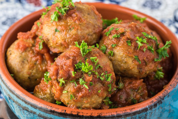 Meatballls in marinara sauce.