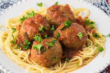 Meatballls in marinara sauce.