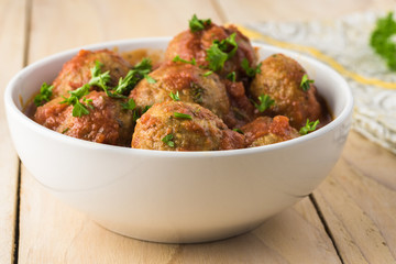 Meatballls in marinara sauce.