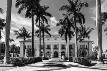Black and white photo showing facade of american mansion in Florida