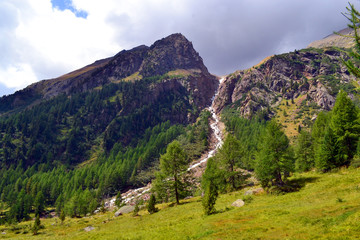 Fototapeta na wymiar A summer landscape view of the Alps mountains in Stelvio National park, val di Pejo