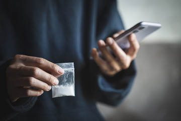 Drug dealers use the phone to contact the customer, drug trafficking, crime, addiction and sale,...