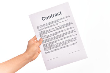 Holding business contract paper over isolated white background
