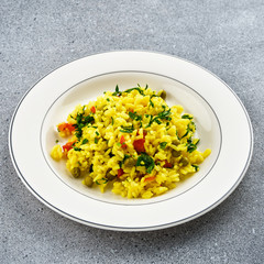 Rice with turmeric and green peas. Traditional Indian cuisine