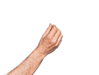 Hand of caucasian middle age man over isolated white background holding blank space with thumb finger, business and advertising