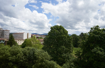 landscape with trees and buildings
