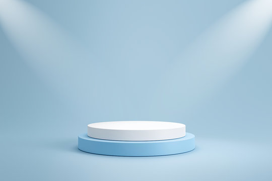 Studio template and white round shape pedestal on light blue background with spotlight product shelf. Blank studio podium for product advertising. 3D rendering.