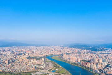 Obraz premium Taipei City Aerial View - Asia business concept image, panoramic modern cityscape building bird’s eye view under daytime and blue sky, shot in Taipei, Taiwan.