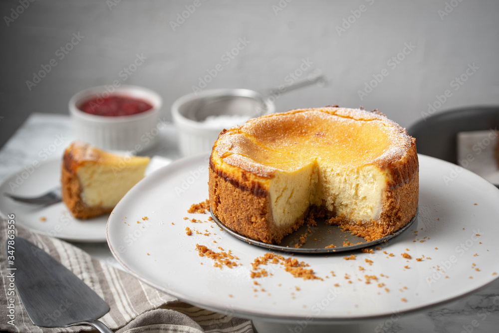 Sticker new york style cheesecake on marble background