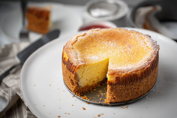 new york style cheesecake on marble background