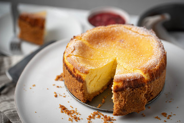 new york style cheesecake on marble background