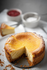 new york style cheesecake on marble background
