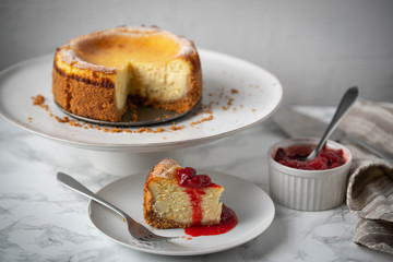 new york style cheesecake on marble background