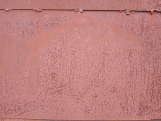 Metal red paint old cracked background, wall background