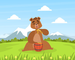 Obraz na płótnie Canvas Brown Bear Sitting on Green Lawn and Eating Honey, Cute Wild Animal with Wooden Barrel Sitting on Summer Mountain Landscape Vector Illustration