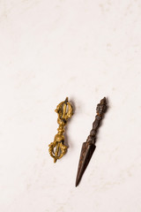 Two vajra on a white background