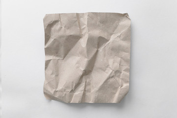 Brown wrinkle recycle paper background. Crumpled brown paper on white background, can use text banners products.