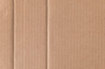 Fototapeta premium Brown cardboard sheet texture background. Texture of recycle paper box in old vintage pattern background.