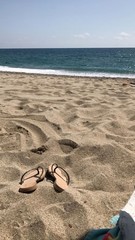 Fototapeta na wymiar sunglasses on the beach