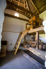 Close up image of an antique stone mill