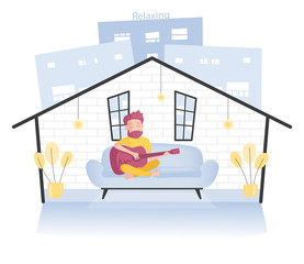Man is playing guitar on the couch at home to support mental heath