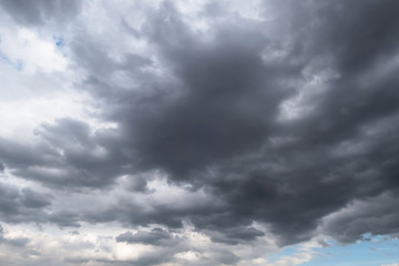 Obraz premium Dark storm clouds before rain used for climate background. Clouds become dark gray before raining.